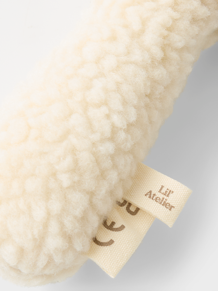 NBNDANCO SHERPA RATTLE LIL  Offwhite