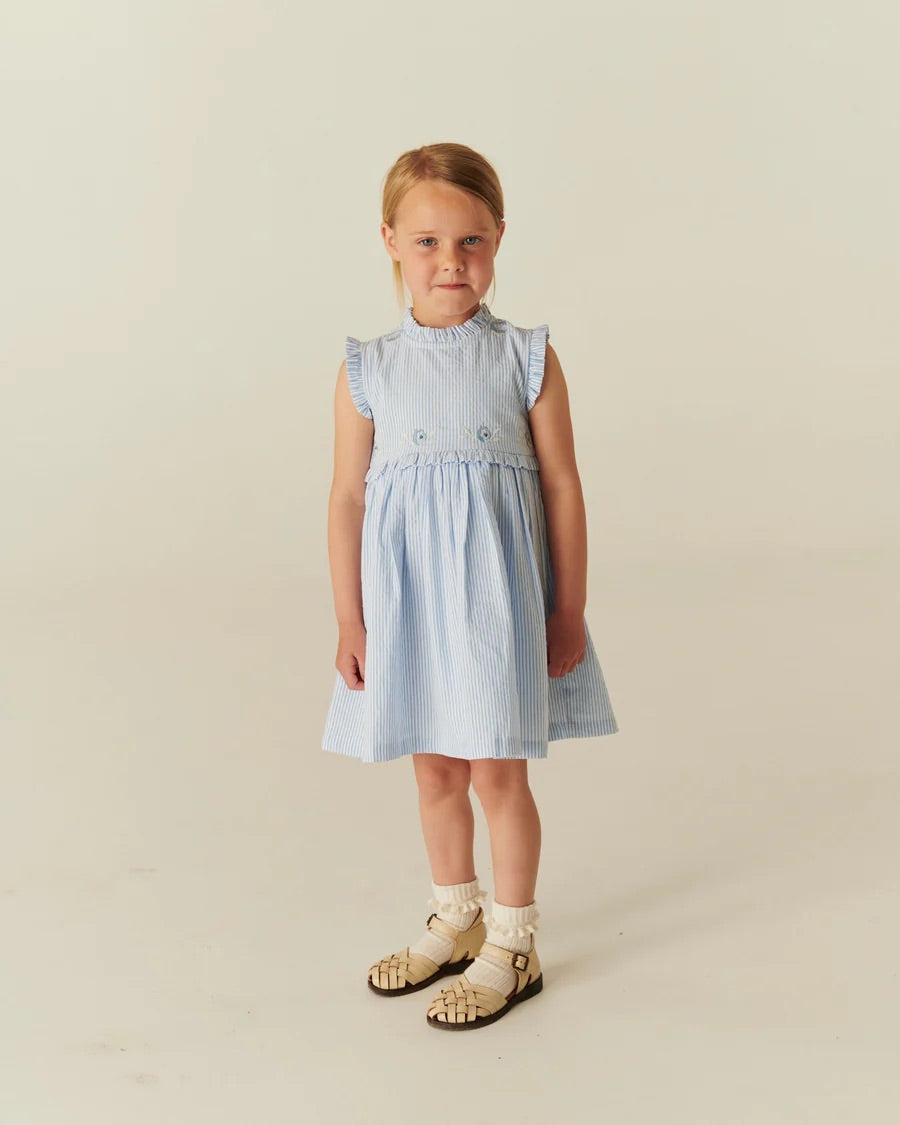 SEERSUCKER DRESS W. RUFFLES AND EMB.  Sky Blue W Cream Stripe